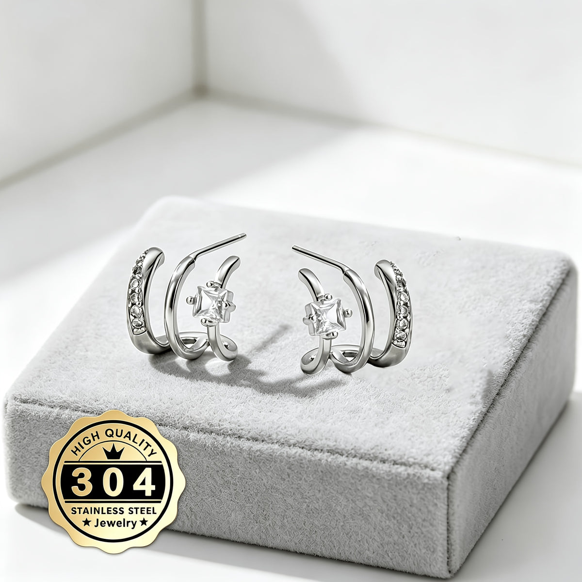 a pair high quality 304 stainless steel triple arc earrings